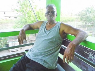 88-year-old Sheechoria Sookhoo breezing out on his veranda 