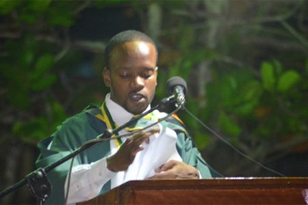 University of Guyana Valedictorian, Joel Joseph addressing fellow graduates yesterday. One thousand, six hundred and five students graduated from the faculties of Agriculture, Forestry, Education and Humanities, Health Sciences, Natural Sciences, Social Sciences and Technology, and the School of Earth and Environmental Sciences. (GINA said)                             