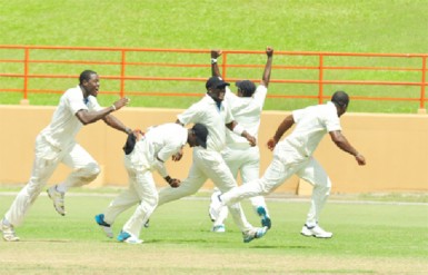 The Barbados team celebrate after keeping their “Pride” in their two-run win over Guyana 