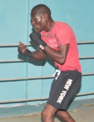 Former world boxing champion, Andrew Lewis training at the Forgotten Youth Foundation Gym. (Orlando Charles photo)