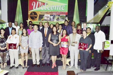 President Donald Ramotar (centre) with winners of Tourism Awards and Tourism Ambassadors. (GINA photo) 