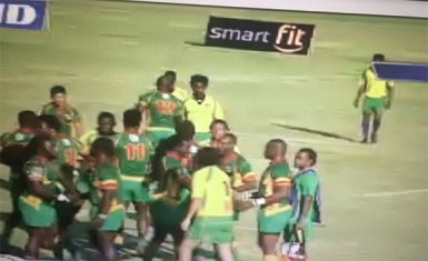 The national men’s rugby team congratulating each other after blanking St. Vincent 47-nil yesterday.