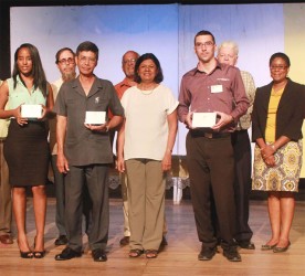  Members of the Theatre Guild and representatives of the sponsors: From left: Princess Marville of Antartic Maintenance and Repairs, Malcolm DeFreitas, Colin Ming from Mings Products and Services, Ron Robinson, Ameena Gafoor, Zach Gonsalves of John Fernandes Ltd, Ian McDonald and Cathy Hughes.