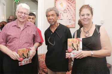 Dr Ian McDonald, Stanley Greaves and another patron were treated to copies of the Moray House Trust’s newly-launched cultural magazine Ku’Wai on Friday evening. (Photo by Arian Browne) 