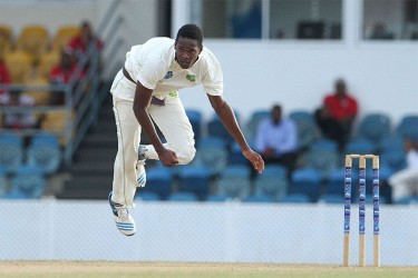 Ronsford Beaton in flight on the third day of the fourth round match between Trinidad & Tobago Red Force and Guyana Jaguars in the WICB Professional Cricket League Regional 4-Day Tournament on Sunday, December 7, 2014 at Queen’s Park Oval. Photo by WICB Media/Ashley Allen