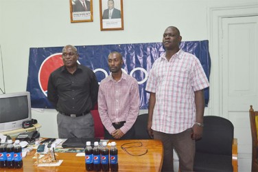 GBA’s president, Steve Ninvalle (left), DDL’s Brand Executive for Pepsi, Larry Wills (centre) and Technical Director of GBA, Terrence Poole  pose for a photo opportunity following yesterday’s press briefing at the Ministry of Sport. (Orlando Charles photo) 