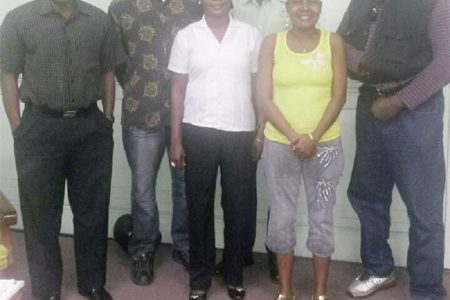 Suriname’s Boxing Association president, Remie Burke (extreme right) poses with a photo with the top brass of the GBA. From left is president of the association, Steve Ninvalle; technical and tournament director, Terrence Poole; head of the referees/judges commission, Ramona Agard; national coach, Wincel Thomas; and secretary of the referee/judges commission, Nicola Yhap.