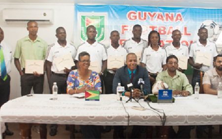 Members of the GFF Normalization Committee (sitting), GFF Referees Committee and FIFA accredited referees pose for a photo opportunity following the conclusion of the press conference held at the entity’s Campbellville headquarters
