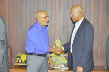 President Donald Ramotar (left) greets Insel Air’s Director of International Affairs, Edward Heerenveen 