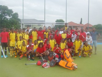 Members of the Guyana Junior National side and the Trinidad National u-19 selection unit pose for a photo opportunity prior to the commencement of their fixture  