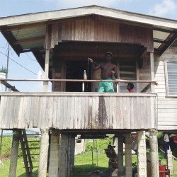  Eon Innis cleaning his bloodstained veranda