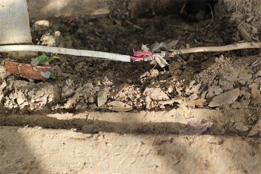 Illegal wiring running at the side of the houses may have caused the fire.  