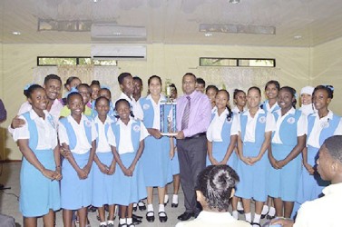 Winner in the large category, St Joseph High School receiving their trophy from Minister of Culture, Youth and Sport, Dr. Frank Anthony (GINA photo) 