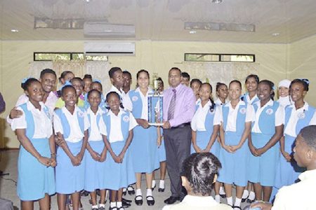 Winner in the large category, St Joseph High School receiving their trophy from Minister of Culture, Youth and Sport, Dr. Frank Anthony (GINA photo)
