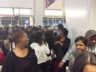 Stranded passengers at JFK yesterday.