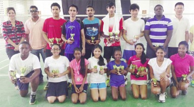 The prize winners following the completion of the annual Woodpecker Products badminton tournament which ended last Saturday at the Queen’s College courts. 