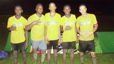 Eagles goal scorers from left to right- Kendolph Louis, Randy Small, Dellon Albert, Kellon Primo and Dellon Charter pose for a photo opportunity following their crushing win over Blueberry Hill Fc 