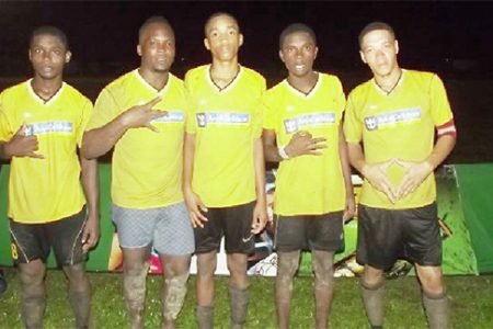 Eagles goal scorers from left to right- Kendolph Louis, Randy Small, Dellon Albert, Kellon Primo and Dellon Charter pose for a photo opportunity following their crushing win over Blueberry Hill Fc
