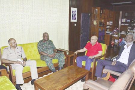 President Donald Ramotar (second from right)  meeting with Army Chief, Brigadier Mark Phillips (second from left) and Police Commissioner (ag), Seelall Persaud (left). Dr  Roger Luncheon is also in this GINA photo.