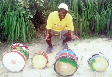 Jerome ‘Three Feet’ Cumberbatch with the drums of the masquerade band 