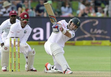 Dean Elgar of South Africa drives during day 1 of the 2nd Test match between South Africa and West Indies at St. Georges Park on December 26, 2014 in Port Elizabeth, South Africa. (Photo by Duif du Toit/Gallo Images) 