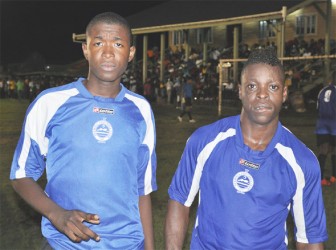 Pouderoyen FC goal scorer’s from left to right-Marvin Frank and Lloyd Prince pose for a photo opportunity following their victory over Uitvlugt Warriors in the third place playoff. 