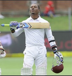 Marlon Samuels celebrates his century during day 4 of the 2nd Test match between South Africa and West Indies at St. Georges Park yesterday in Port Elizabeth, South Africa. (Photo by Duif du Toit/Gallo Images) 