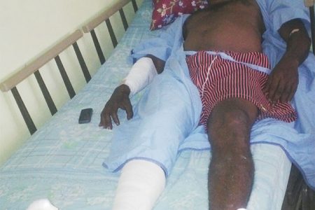 An injured Clinton Gobin at the Georgetown Public Hospital yesterday afternoon.