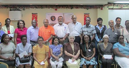 This Guyana Goldfields photo shows the recipients with company officials.