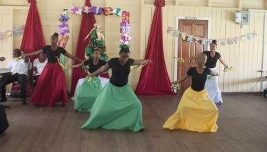 Children of the Rosemary Lane Youth Club performing a dance yesterday at the annual Christmas luncheon for  children put on by the police.