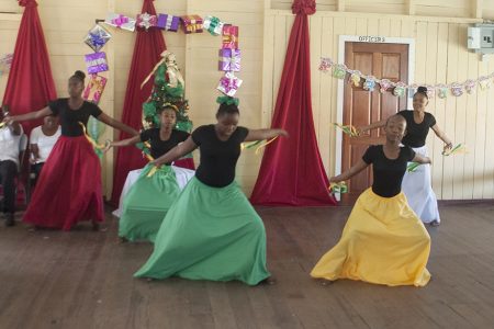 Children of the Rosemary Lane Youth Club performing a dance yesterday at the annual Christmas luncheon for  children put on by the police.