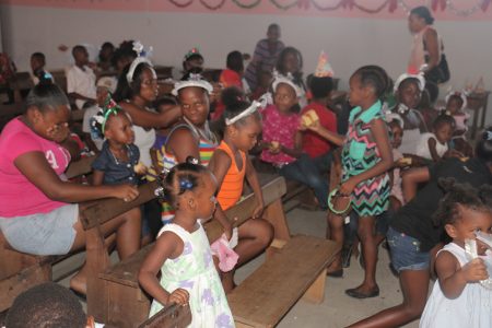 A section of the children at the Dharm Shala’s annual party for children in Albouystown today.