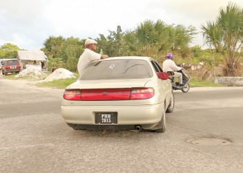 This man was drinking a beer half out of this car while it was driving along Princes St into Cemetery Road yesterday.