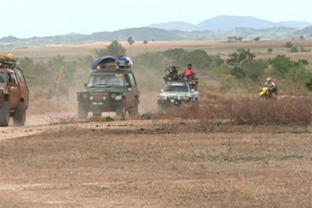 Some of the vehicles and a biker arrive in the South Rupununi (GINA photo)