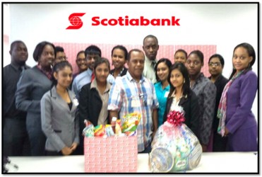 On December 12, 2014 Scotiabankers of the Credit Risk and Collections Departments travelled to the Ancient Country to make a donation of food hampers to the Alpha Children’s Home at New Amsterdam, a release from the bank said. A representative from the home accepted the gift on behalf of the children. The orphanage houses 16 children, several of whom require special needs care, the release said. 