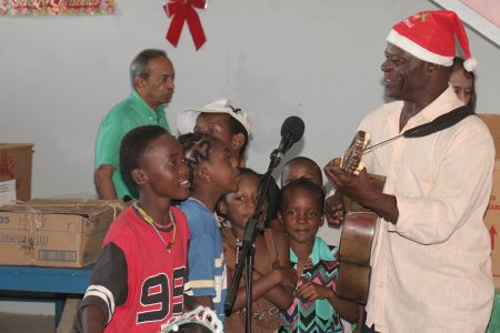 Children at the Dharm Shala  party in Albouystown were  treated to a variety of music.