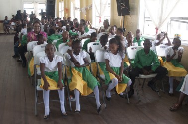 The police yesterday held their annual Christmas luncheon for  children of the Rosemary Lane Youth Club at the Police Sports Club, Eve Leary. This photo shows a section of the children who attended.