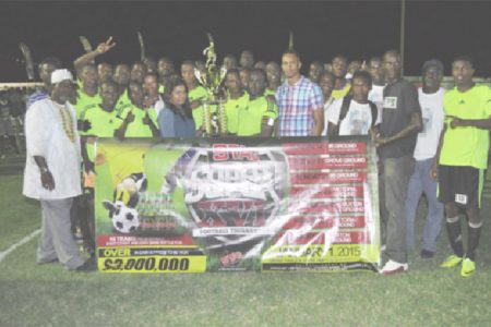 Grove Hi-Tech captain Sherman Doris collecting the championship trophy from Ansa McAl PRO Darshanie Yussuf while members of the club inclusive of players and executives look on.