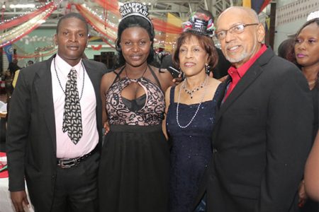 Guyanese celebrating the New Year with President Donald Ramotar and the First Lady at the GDF ball.
