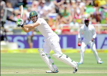 Faf du Plessis of South Africa ondrives  during day 2 of the 3rd Test between South Africa and West Indies at Sahara Park Newlands  yesterday in Cape Town, South Africa. (Photo by Carl Fourie/Gallo Images)