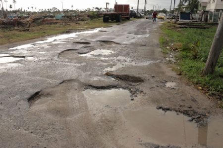 Really bad road: This potholed patch is at the Princes and Chapel streets junction in Lodge. (Photo by Arian Browne) 