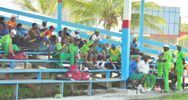 Head Coach Esaun Crandon and Assistant Coach Rayon Griffith have a chat with the players after their training session yesterday at Everest.
