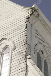 Rotted wooden panels along the western side of the St George’s Cathedral. (Arian Browne photo) 