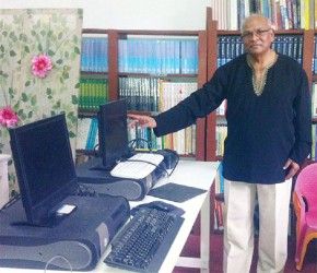 Ramdular Singh in the computer lab and library 