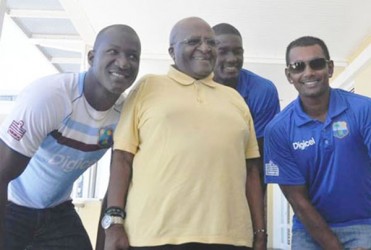 Archbishop Tutu with West Indies captains Darren Sammy, Jason Holder and Denesh Ramdin 