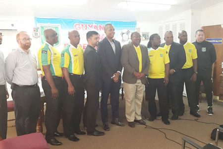 Newly Appointed Head-Coach Jamaal Shabazz (seventh from left) posing for a photo opportunity while being flanked by members of GFF Normalization Committee and technical staff inclusive of Chairman Clinton Urling (sixth from left) and GFF Technical Director Claude Bolton (right)