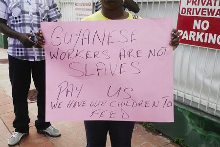 One of the placards the workers held up during the protest.