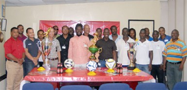 Representatives of Alpha United, the Guyana Defence Force, Western Tigers, Pele FC, the Georgetown Football Association and Banks DIH Limited at the presentation ceremony 