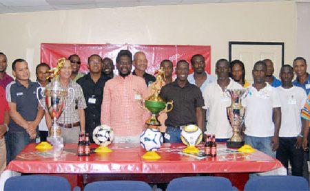 Representatives of Alpha United, the Guyana Defence Force, Western Tigers, Pele FC, the Georgetown Football Association and Banks DIH Limited at the presentation ceremony
