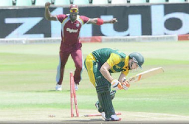 Rilee Rossouw of South Africa is bowled by Jerome Taylor of the West Indies during the first Momentum ODI at Sahara Stadium Kingsmead  yesterday in Durban, South Africa. (Photo by Lee Warren/Gallo Images)